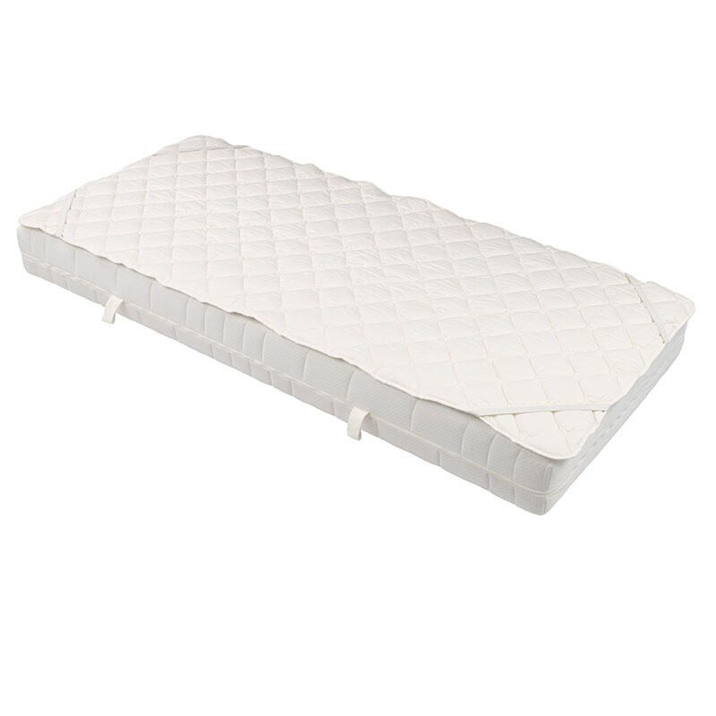 Vitality Pur Nature Dream 100% Katoenen Matrasbeschermer bevestigd op een matras met elastische hoekbanden